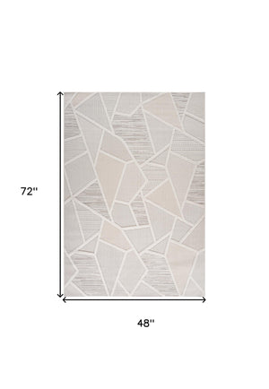 Homeroots 4' X 6' Cream And Beige Geometric Distressed Area Rug  Polyester 558407