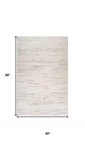 HomeRoots 5' Gray and Beige Abstract Distressed Area Rug - Durable, Stain-Resistant Design for Any Room 5' X 8' 558460