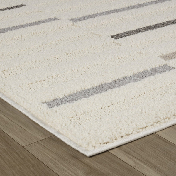 HomeRoots 5' Gray and Cream Abstract Distressed Area Rug - Modern Elegance for High-Traffic Spaces and Homes 8' X 11' 558467