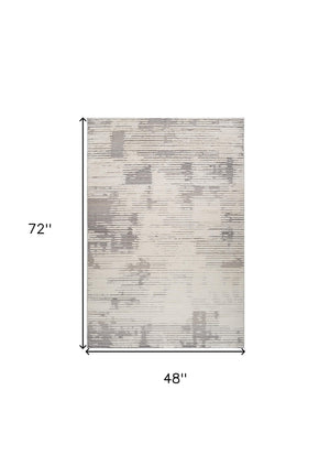 Homeroots 4' X 6' Gray And Cream Abstract Distressed Area Rug  Polypropylene 558469