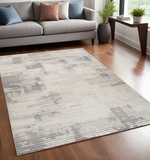 HomeRoots 5' Gray and Cream Abstract Distressed Area Rug - Stylish, Durable Design for Busy Homes & Modern Decor 5' X 8' 558470