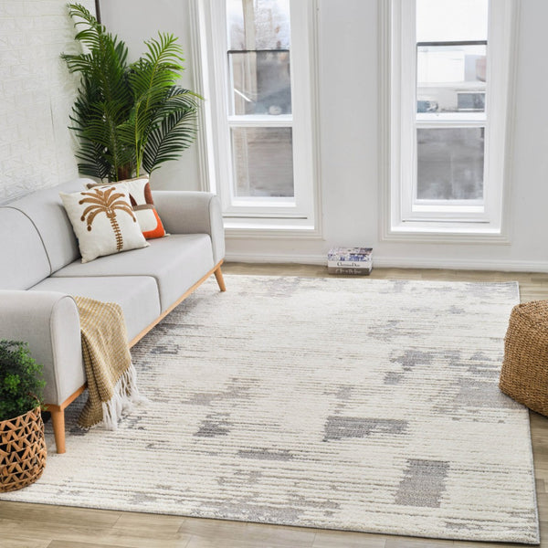 HomeRoots 5' Gray and Cream Abstract Distressed Area Rug - Stylish, Durable Design for Busy Homes & Modern Decor 5' X 8' 558470