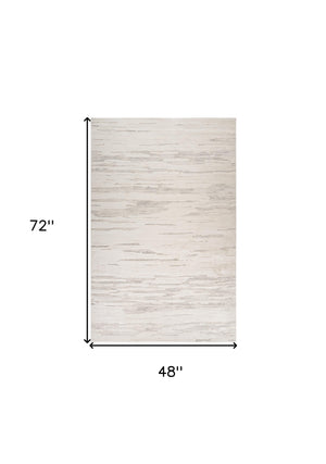 Homeroots 4' X 6' Cream And Beige Abstract Area Rug  Polyester 558502