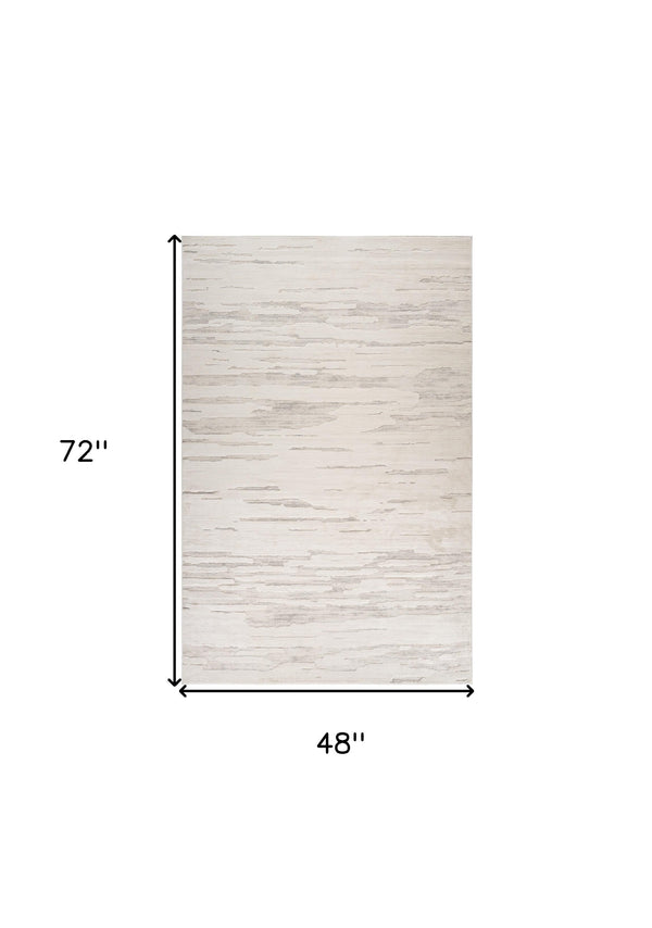 Homeroots 4' X 6' Cream And Beige Abstract Area Rug  Polyester 558502