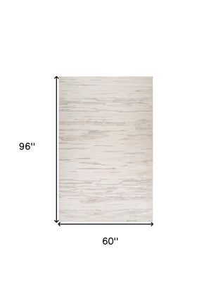 Homeroots 5' X 8' Cream And Beige Abstract Area Rug  Polyester 558503