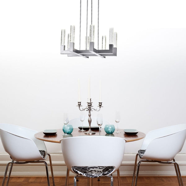 HomeRoots Silver Candle-Style Eight-Light Chandelier: Dimmable Elegance with Clear Shades for Any Space 558622