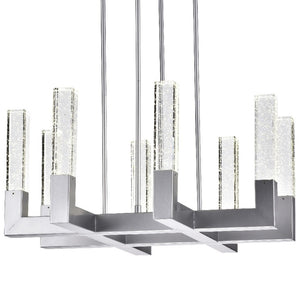 HomeRoots Silver Candle-Style Eight-Light Chandelier: Dimmable Elegance with Clear Shades for Any Space 558622