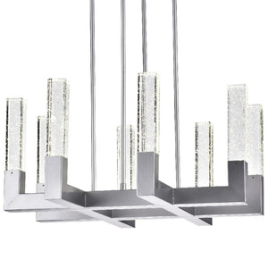 HomeRoots Silver Candle-Style Eight-Light Chandelier: Dimmable Elegance with Clear Shades for Any Space 558622