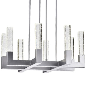 HomeRoots Silver Candle-Style Eight-Light Chandelier: Dimmable Elegance with Clear Shades for Any Space 558622