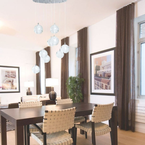 HomeRoots Silver Nine-Light Chandelier: Elegant Tiered Design with Clear Glass Shades for Modern Spaces 558710