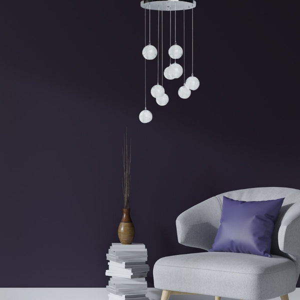 HomeRoots Silver Nine-Light Chandelier: Elegant Tiered Design with Clear Glass Shades for Modern Spaces 558710