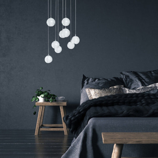 HomeRoots Silver Nine-Light Chandelier: Elegant Tiered Design with Clear Glass Shades for Modern Spaces 558710