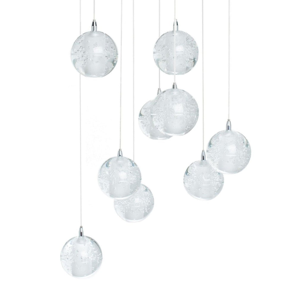 HomeRoots Silver Nine-Light Chandelier: Elegant Tiered Design with Clear Glass Shades for Modern Spaces 558710