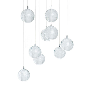 HomeRoots Silver Nine-Light Chandelier: Elegant Tiered Design with Clear Glass Shades for Modern Spaces 558710