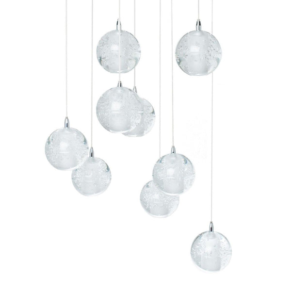 HomeRoots Silver Nine-Light Chandelier: Elegant Tiered Design with Clear Glass Shades for Modern Spaces 558710
