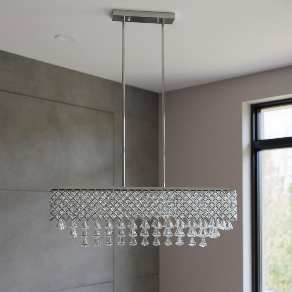 HomeRoots Silver Contemporary Twelve-Light Dimmable Chandelier with Clear Shades for Modern Décor Spaces 558715