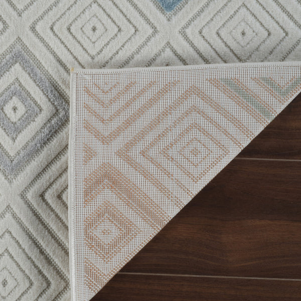 Homeroots 5' X 7' Cream And Beige Geometric Distressed Indoor Outdoor Area Rug  Polypropylene 558730