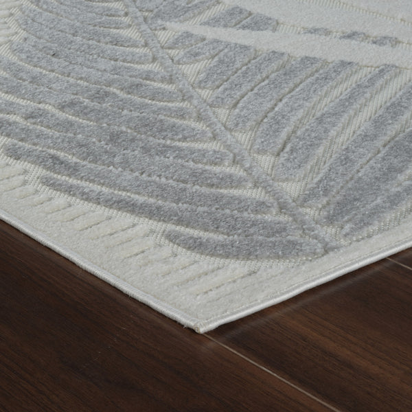 Homeroots 5' X 7' Cream And Beige Botanical Leaves Distressed Indoor Outdoor Area Rug  Polypropylene 558732