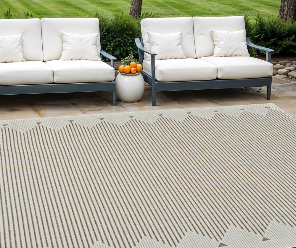 Homeroots 6' X 9' Beige And Brown Geometric Distressed Indoor Outdoor Area Rug  Polypropylene 558755