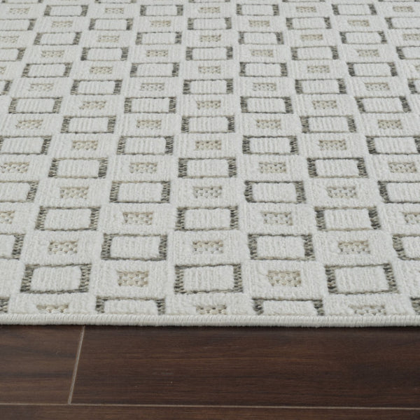 HomeRoots 4' Cream and Beige Geometric Distressed Area Rug - Durable, Stain-Resistant, Indoor/Outdoor Style 5' X 7' 558768