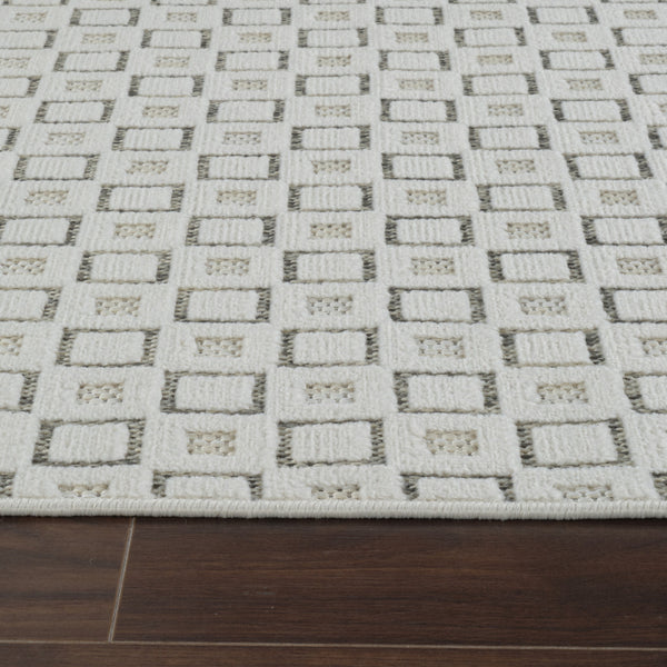 Homeroots 6' X 9' Cream And Beige Geometric Distressed Indoor Outdoor Area Rug  Polypropylene 558769