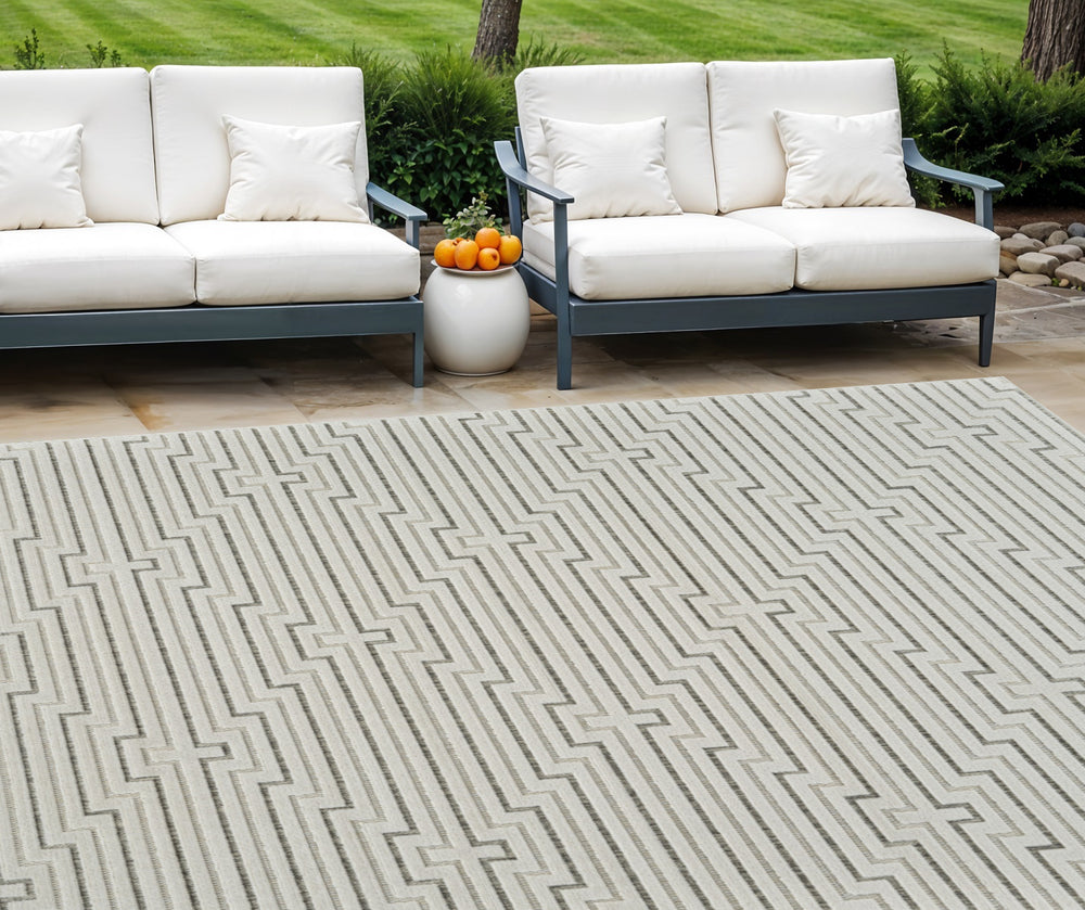 Homeroots 8' X 10' Cream And Beige Geometric Distressed Indoor Outdoor Area Rug  Polypropylene 558791