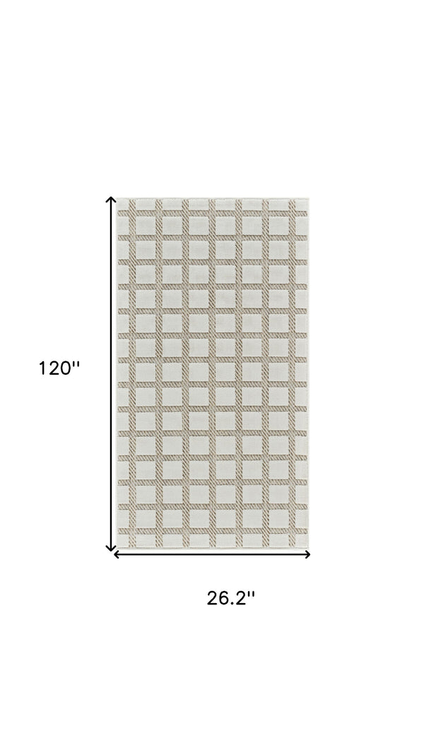 Homeroots 10' Cream And Beige Geometric Distressed Indoor Outdoor Runner Rug  Polypropylene 558792
