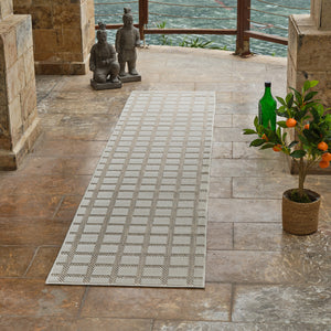 Homeroots 10' Cream And Beige Geometric Distressed Indoor Outdoor Runner Rug  Polypropylene 558792