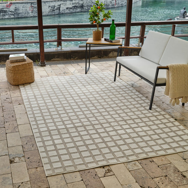 HomeRoots 4' Cream and Beige Geometric Distressed Area Rug – Durable, Water-Resistant for Indoor & Outdoor Use 4' X 6' 558795