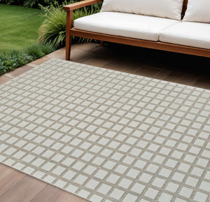 HomeRoots 4' Cream and Beige Geometric Distressed Area Rug – Durable, Water-Resistant for Indoor & Outdoor Use 6' X 9' 558797