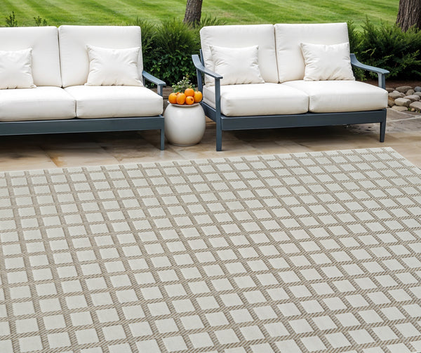 Homeroots 8' X 10' Cream And Beige Geometric Distressed Indoor Outdoor Area Rug  Polypropylene 558798