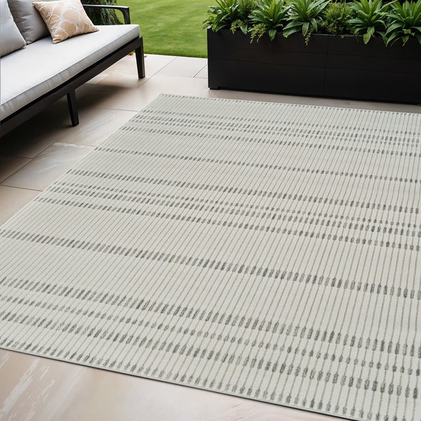 Homeroots 5' X 7' Cream And Beige Striped Distressed Indoor Outdoor Area Rug  Polypropylene 558803