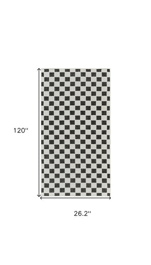 Homeroots 10' Black And White Geometric Distressed Indoor Outdoor Runner Rug  Polypropylene 558806