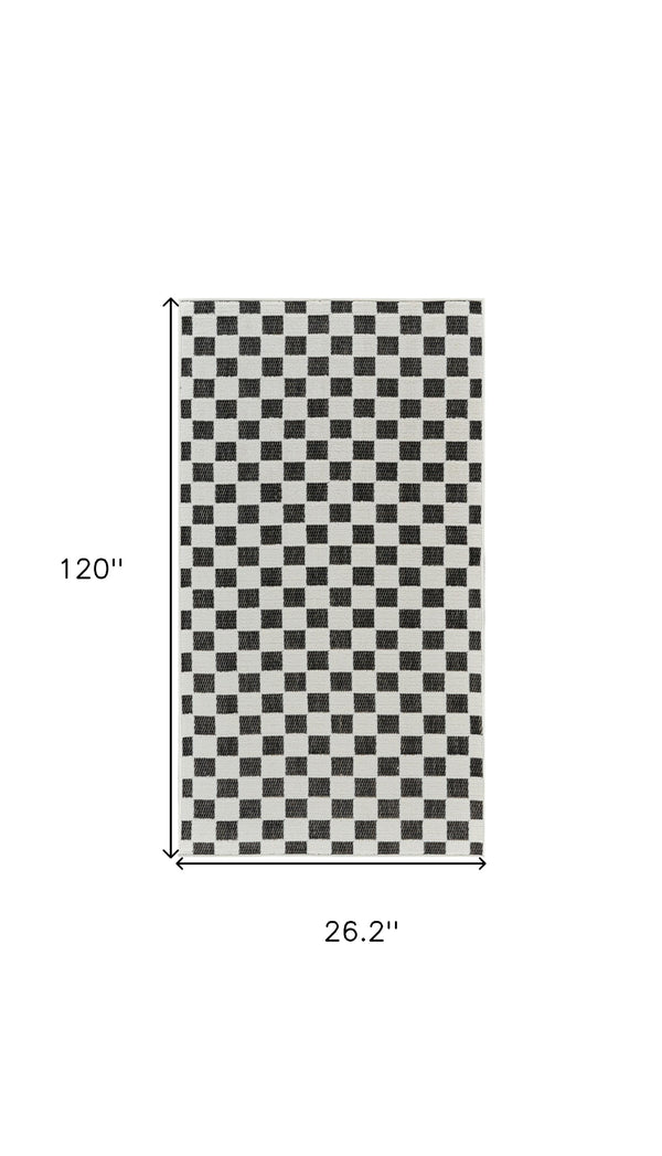 Homeroots 10' Black And White Geometric Distressed Indoor Outdoor Runner Rug  Polypropylene 558806