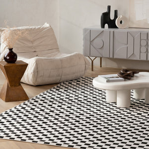 HomeRoots 4' Black and White Geometric Distressed Area Rug - Durable, Stylish Indoor/Outdoor Essential for Homes 4' X 6' 558809