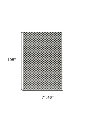 Homeroots 6' X 9' Black And White Geometric Distressed Indoor Outdoor Area Rug  Polypropylene 558811