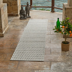 Homeroots 10' Cream And Beige Geometric Distressed Indoor Outdoor Runner Rug  Polypropylene 558813