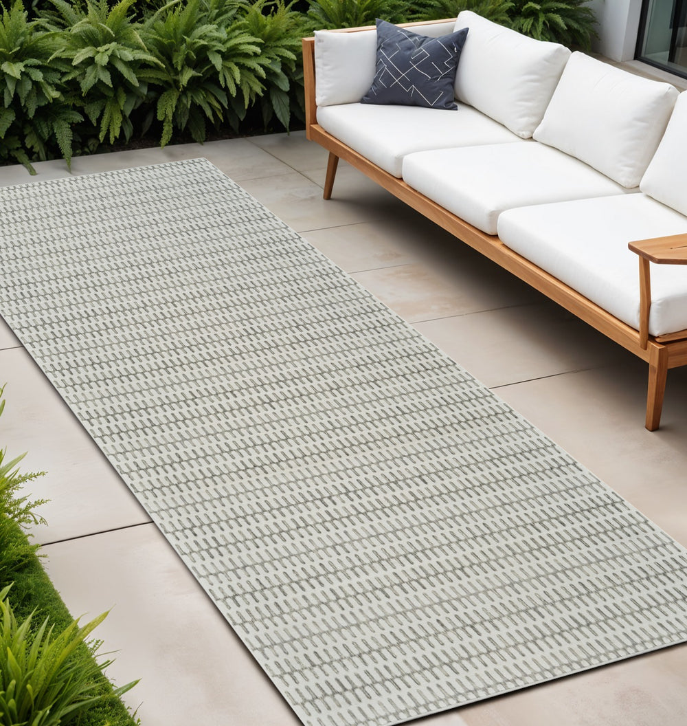 Homeroots 10' Cream And Beige Geometric Distressed Indoor Outdoor Runner Rug  Polypropylene 558813
