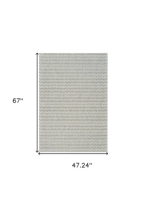 Homeroots 4' X 6' Cream And Beige Geometric Distressed Indoor Outdoor Area Rug  Polypropylene 558816