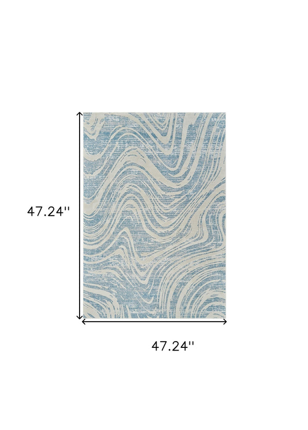 Homeroots 4' X 6' Blue And Beige Abstract Distressed Area Rug  Polypropylene 558828