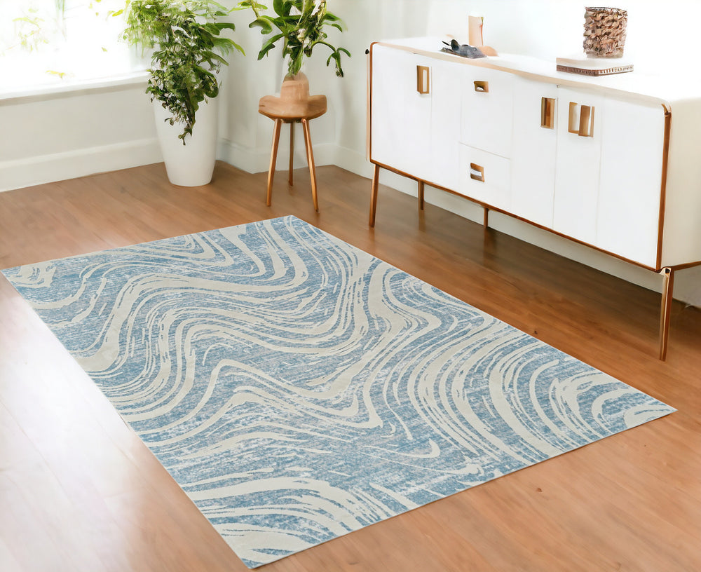 Homeroots 4' X 6' Blue And Beige Abstract Distressed Area Rug  Polypropylene 558828