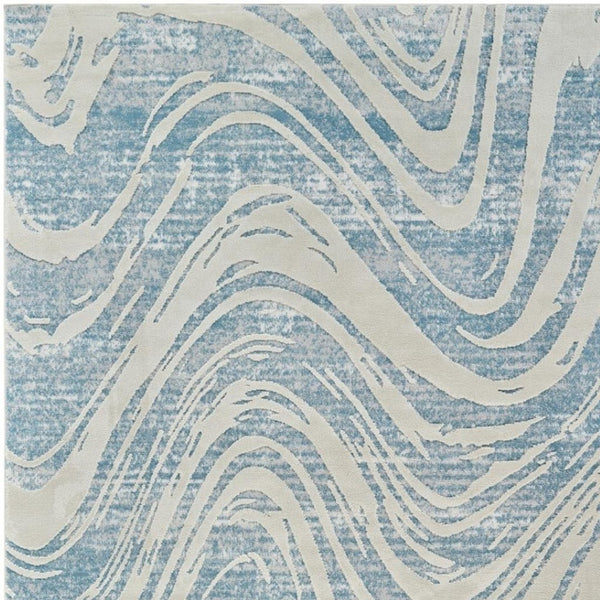 HomeRoots 4' Blue and Beige Abstract Distressed Area Rug – Stylish, Durable, and Perfect for High-Traffic Spaces 5' X 8' 558829