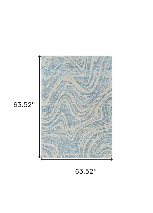 Homeroots 5' X 8' Blue And Beige Abstract Distressed Area Rug  Polypropylene 558829