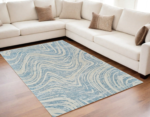 Homeroots 5' X 8' Blue And Beige Abstract Distressed Area Rug  Polypropylene 558829