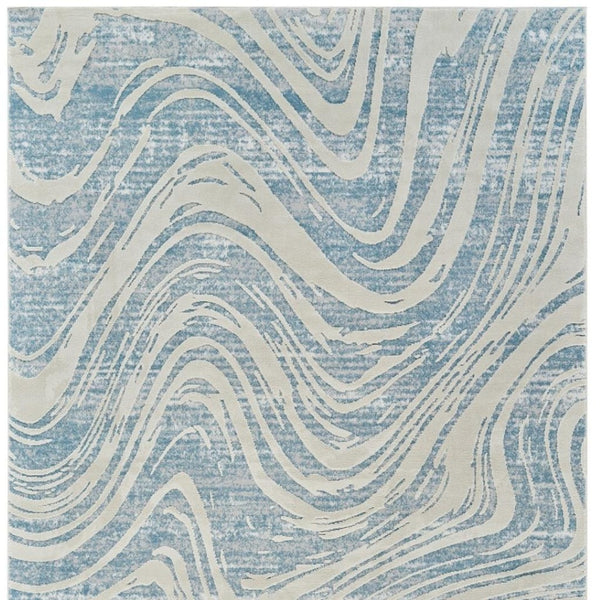 HomeRoots 4' Blue and Beige Abstract Distressed Area Rug – Stylish, Durable, and Perfect for High-Traffic Spaces 8' X 11' 558831