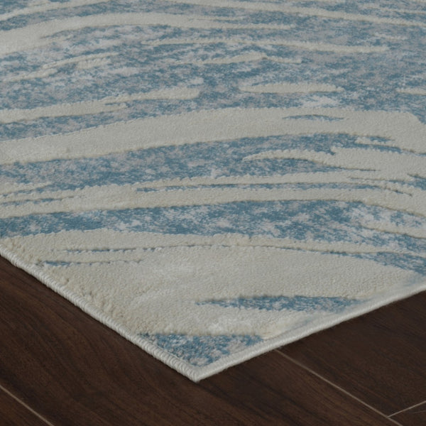 HomeRoots 4' Blue and Beige Abstract Distressed Area Rug – Stylish, Durable, and Perfect for High-Traffic Spaces 8' X 11' 558831