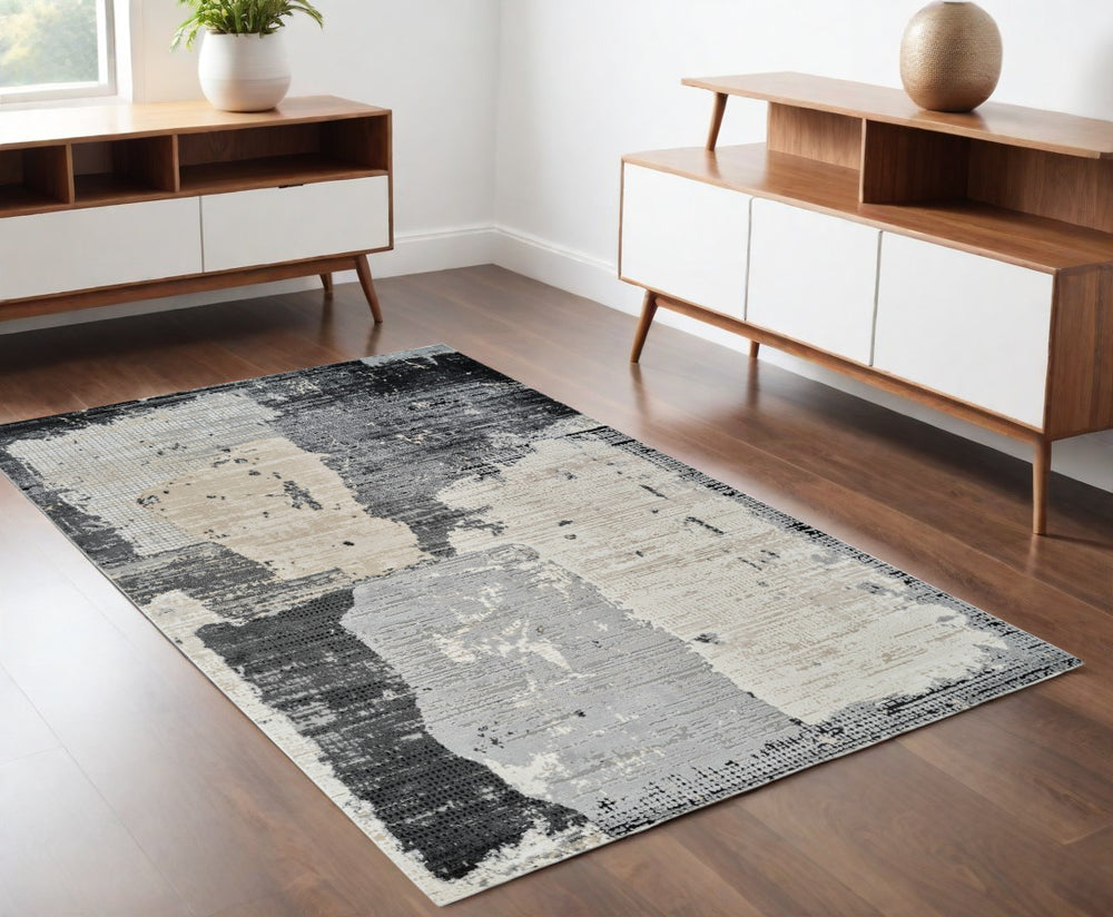 Homeroots 4' X 6' Beige And Black Abstract Distressed Area Rug  Polypropylene 558840
