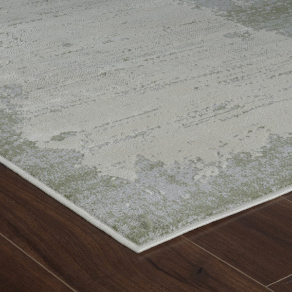 HomeRoots 4' Beige and Green Abstract Distressed Area Rug - Stylish, Stain-Resistant Design for Home Spaces 4' X 6' 558848