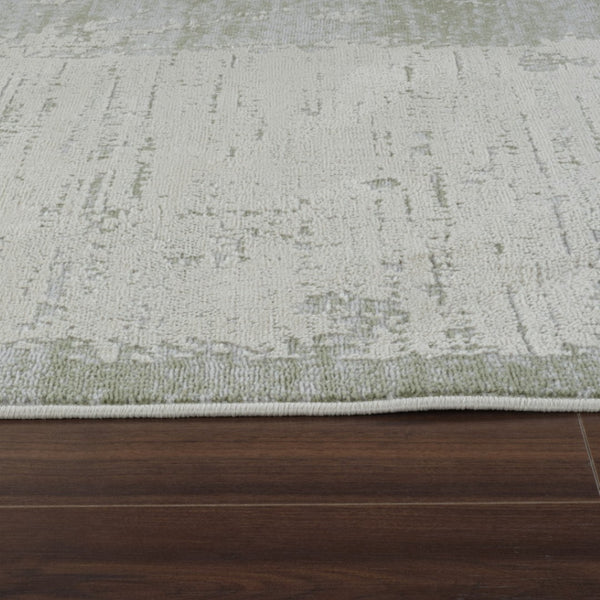 HomeRoots 4' Beige and Green Abstract Distressed Area Rug - Stylish, Stain-Resistant Design for Home Spaces 4' X 6' 558848
