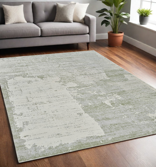 Homeroots 5' X 8' Beige And Green Abstract Distressed Area Rug  Polypropylene 558849